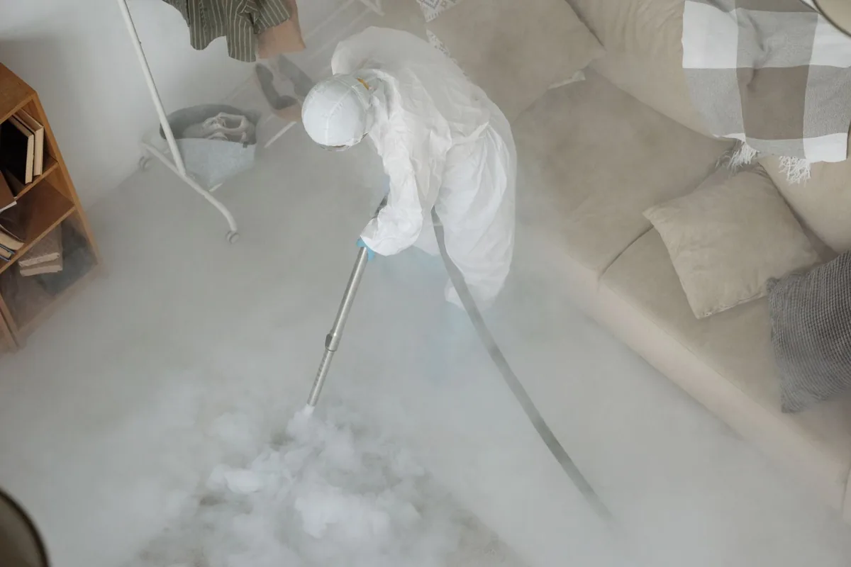 Biohazard cleanup technician in protective equipment, Walterboro, SC